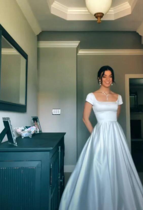 a line beach wedding dress Simple A-Line Satin Wedding Dress with Back Bow, Spaghetti Straps, Poc –  Viniodress main image 0